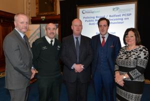 Caption: Pictured at public meeting in City Hall City Hall are: (l-r) Nigel Grimshaw, Belfast City Council, Supt Ryan Henderson, Chief Constable George Hamilton,  Belfast PCSP Chair Cllr John Hussey and Board Chair Anne Connolly. 