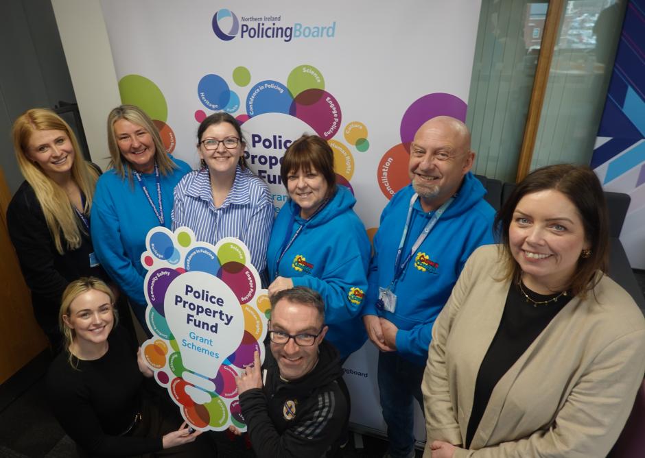 A group of people smiling at the camera